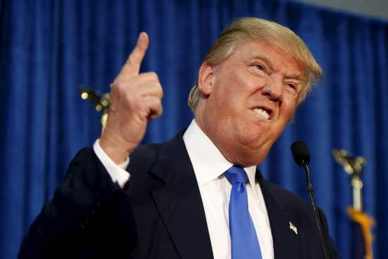 Republican presidential candidate Donald Trump gestures and declares "You're fired!" at a rally in Manchester, New Hampshire, June 17, 2015. REUTERS/Dominick Reuter TPX IMAGES OF THE DAY - RTX1GZCO