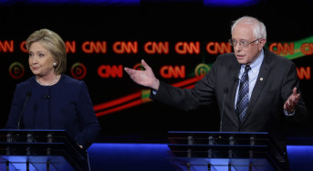 The Democratic Debate:  Round 7 — The Poisoning of a City Takes Center Stage
